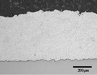 Fig. 3. Optical image of a cross section through the Al-12Sn coating prepared using the JP5000 HVOF system