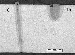 Fig.7. Cross-sections of welds produced using a 2mm.mrad YLR-4000 Yb-fibre laser at 4kW (at the workpiece), a 200µm focal spot and a welding speed of 3m/min: a) with argon side-jet, with argon cross-jets; b) with argon side-jet, without argon cross-jets 