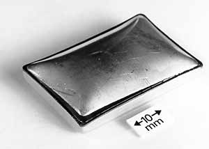 Fig.6. Typical Au-plated stepped lid package showing failure through Ni-Fe-Co alloy lid during pressure testing