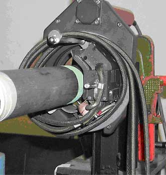 Fig.3. MESSER Polysoude welding equipment used for the orbital welding of tube. Note the flux coating on the tube prior to welding