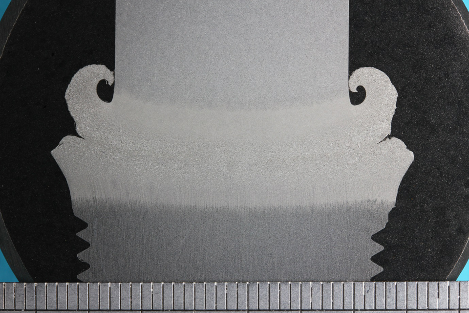 Figure 17 Macro section through a friction weld used to attach threaded ends to some of the SENT specimens.