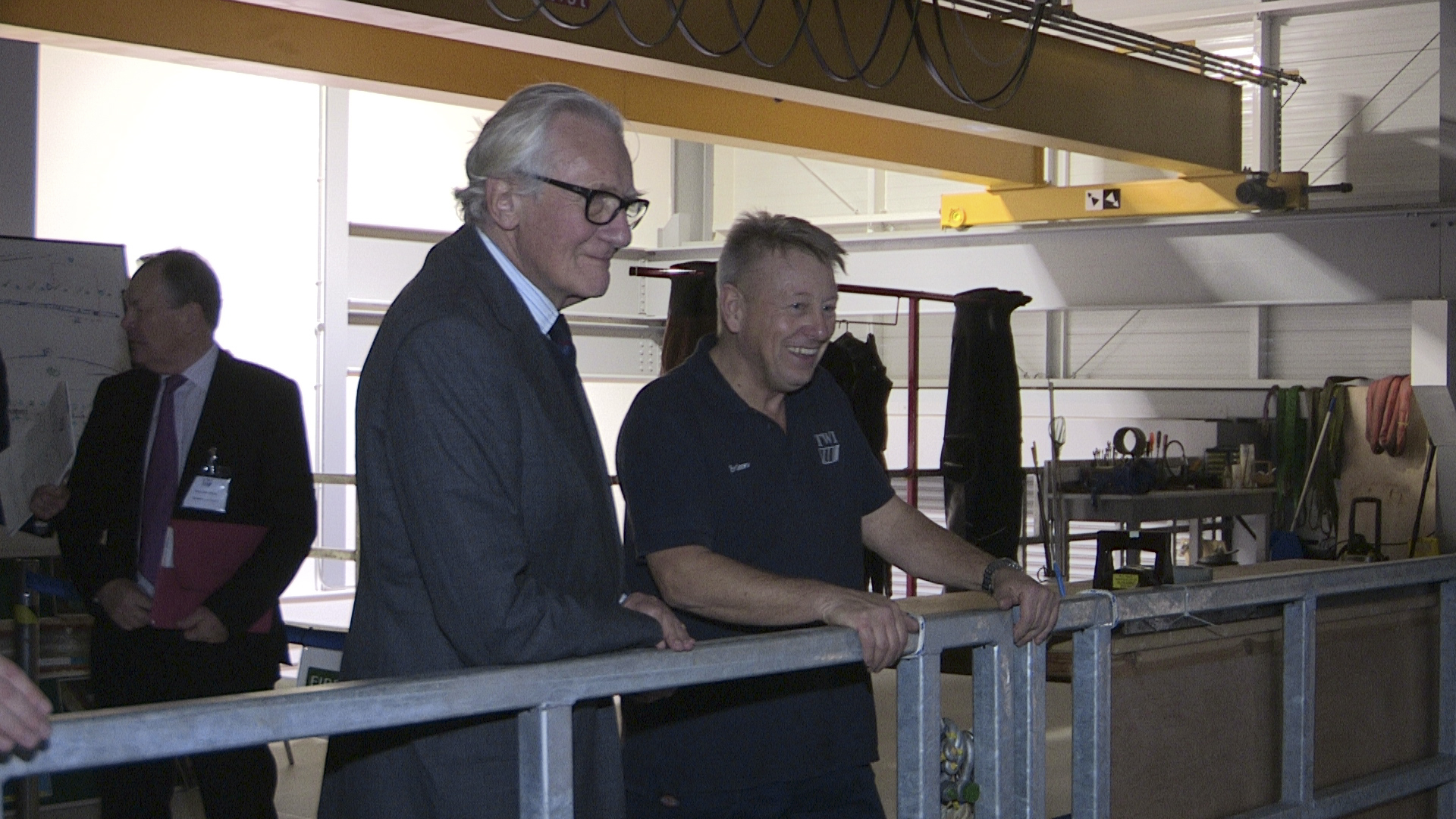 TWI's Brian Mulrooney shows Lord Heseltine the facility's diver training tank