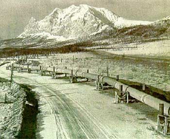 The pipeline snakes south with Mount Sukakpak in the background (Courtesy British Petroleum)