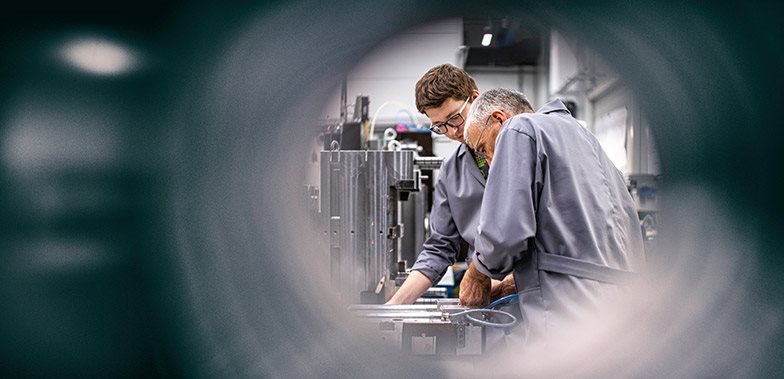 Engineers fixing a machine