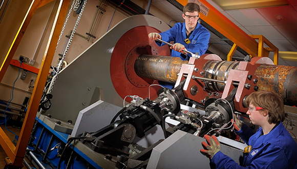 Innovative rotating four-point bending machine for full scale sour service testing, designed and built by TWI