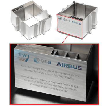 Figure 2. LFW PMD Box technology 
 demonstrator. The engraved text reads:
“Near-Net-Shape Propellant Management Device Manufactured by Linear Friction Welding. General Support Technology Programme funded by ESA. Designed by Airbus Defence and Space, Stevenage. Prototype Manufactured by TWI Ltd.”
