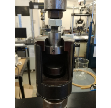 Figure 2. Photograph of specimen in a tensile testing machine