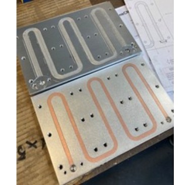 Figure 9. CoreFlow prototype (top) and plate produced using traditional methods (below) for a comparative study