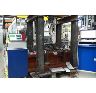 Figure 7. Experimental setup with Vallen AE system and bending machine