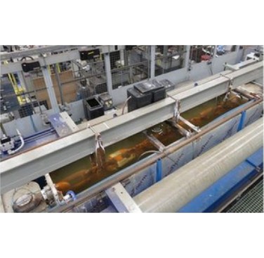 Figure 1. Full-scale fatigue test set-up in free corrosion conditions in seawater