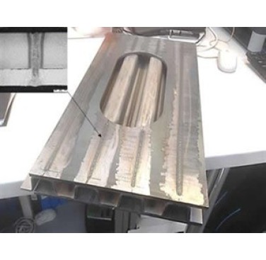 Figure 4. Laser stake welded sandwich panel with (inset) typical cross-section