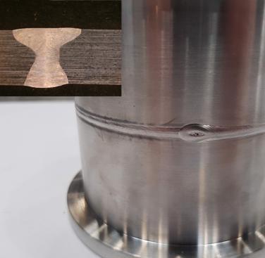 Figure 30. Example of an orbital weld made between two 3mm wall thickness stainless steel pipe sections and (inset) a typical weld cross-section