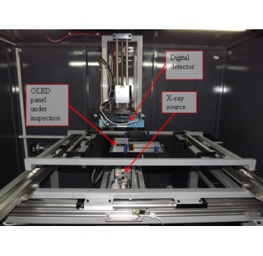 Figure 5. PlastronicsSpec system showing the X-ray source, digital detector and the OLED panel from OTS (consortium partner-SME)