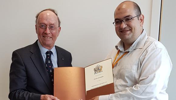 Previous Master, Professor Bill Bonfield (left) and NSIRC/University of Aberdeen student Kostas Georgilas (right). 