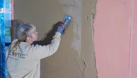 Application of insulating, moisture buffering internal clay plaster