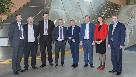 (L-R) Dr David Panni (JCB Group Structures Manager), Andy Young (JCB Group Manufacturing Engineering Manager), Mike Russell (TWI Operations Director), Jon Savage (TWI Construction and Engineering Section Manager), Martyn Wright (TWI Training Group Manager), Paul Grys (JCB Group Business Operations Director), Simone Gubbins (TWI External Affairs Manager), Tim Burnhope (JCB Chief Innovation Officer) 
