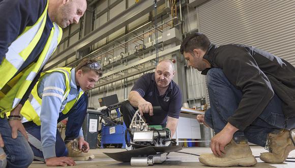 TWI’s plastic welder training expert, Tony Kraus, delivering lining membrane welding training using a Leister Geostar 5 at TWI’s Plastic Welder Training Centre in Middlesbrough