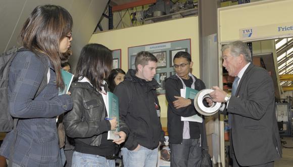 Roger Wheatley (Right) conducts a tour at TWI