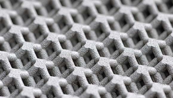 Additively manufactured metal lattice