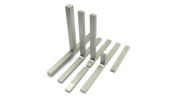 Figure 2.	SS-FSW Titanium T-joint, the specimens from left to right: 1) Welded, 2) Machined to shape, 3) Tensile failure location on the base plate and 4) Tensile failure location on the leg plate, showing both failures in the parent material