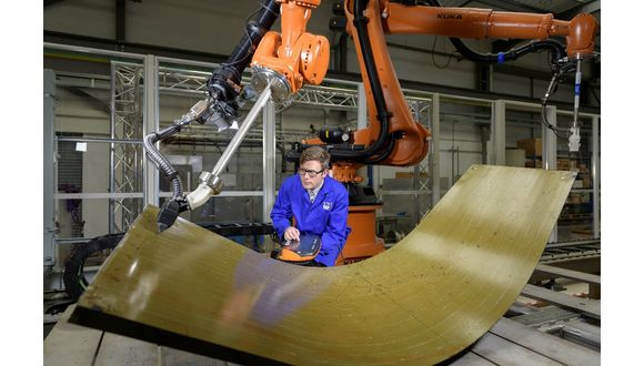 Phased array robotic inspection of a component using robots. Future Crystal releases will include support for robotic inspection using FMC