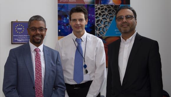 Vaughan Gething (left) alongside TWI's Ian Nicholson and CEO Aamir Khalid (right)
