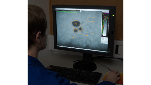 Figure 1. Analysis of digital radiograph in dark room conditions at TWI Cambridge