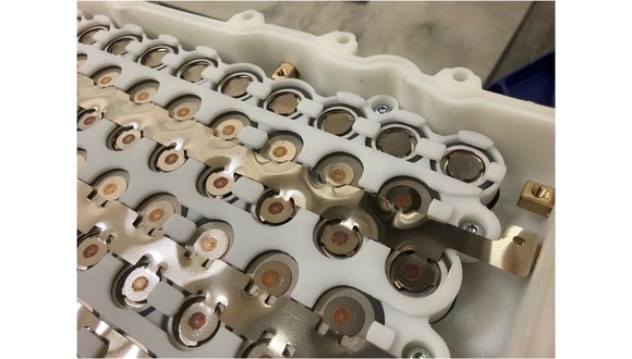 Figure 5. Examples of scanned laser beam welds between copper busbars and steel cells