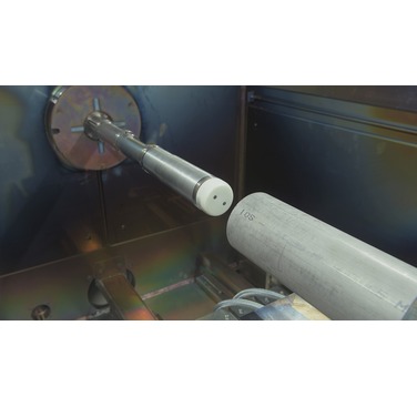 Figure 1. EBOBend equipment inside the EB vacuum chamber