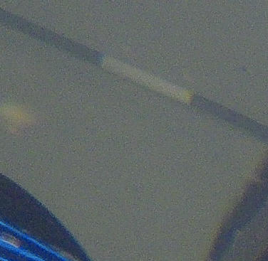 The inspection system operating underwater on a vertical plate