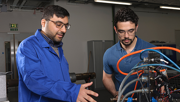 Hesham (left) and fellow NSIRC student. Photo: TWI / NSIRC