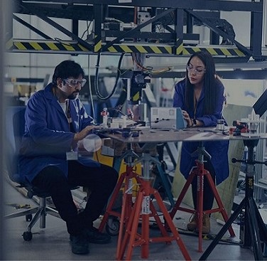 PhD students working in the NSIRC engineering laboratories.