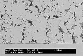 Fig.4a) BSE image of FTi sprayed onto ground Ti6Al4V at 29 bar