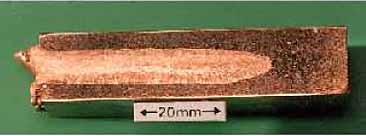 a) fusion zone exhibiting well radiused tip free from root defects 