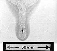 Fig.13. Non-pulsed NVEB melt run in ferritic steel made in flat position showing a centreline crack and very wide top bead