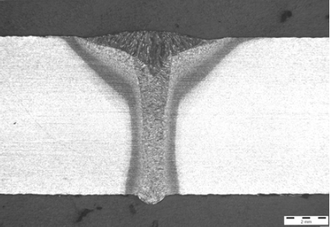 Figure 3. a) Butt weld between 8mm steel plates, made at 1.6m/min, with a wire feed rate 7m/min, and arc voltage trim of -3V