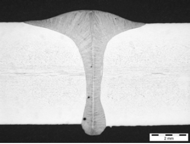 b) Butt weld between 6mm stainless steel plates, made at 2.5m/min, with a wire feed rate 8m/min, and without arc voltage trim