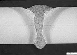 Fig. 5. Cross-section through a hybrid weld made over a joint with a 0.5mm wide gap, welding at 1.2m/min with a wire feed rate of 9m/min 