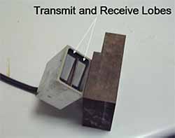 Fig. 2. The 2.5MHz TRLPA probe showing transmit and receive lobes, each of which is composed of a 4x16 matrix array (128 elements in total), with a pitch of 2mm along the major axis and 3mm along the minor axis (manufactured by Vermon, France). 