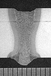 Fig.13. Macrograph of a hybrid Nd:YAG laser/MAG weld in X60 pipeline steel showing an acceptable weld with 11mm full penetration. Laser power at the workpiece 8.0kW, travel speed 1.0 m/min