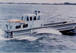 Fig.1 Toughened acrylics show their durability in the assembly of a naval landing craft. Rivets are reduced to a minimum when the adhesive is used. The small number of rivets are used to pull the sections together and hold themin position whilst the adhesive cures