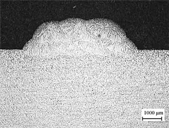 Fig.9. Macrograph of a cross section of a multiplayer deposit in an aeroengine alloy