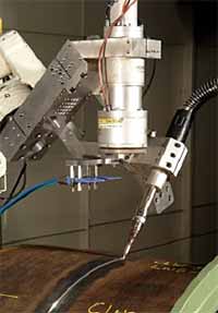 Fig.4. Laboratory demonstration of hybrid Nd:YAG laser/GMA welding for pipelines