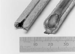 Fig.6 Example of partly consumed electrodes, Ridgeback™ electrode on the left-hand side, round wire (prior art) consumable on the right-hand side.