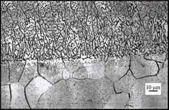 Fig. 2 - Top section of fusion line of continuous wave Nd:YAG laser welded 7475 aluminium