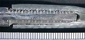 c) Shear failure in composite