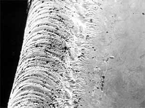 Fig.19. General appearance of pulsed weld on electroless Ni-plated Kovar package; condition 150W, 0.5m/min, lmsec pulse at 150Hz, x37