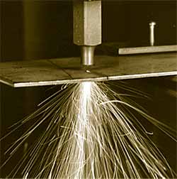 Fig.2. The first oxygen assist gas laser cutting performed in May 1967