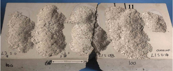 Fig.9. The scabbling process on concrete containing limestone aggregate: