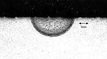 Fig. 4. Transverse section of a melt run produced in helium at a pressure of 50bar at 2.6kW with a welding speed of 0.6m/min